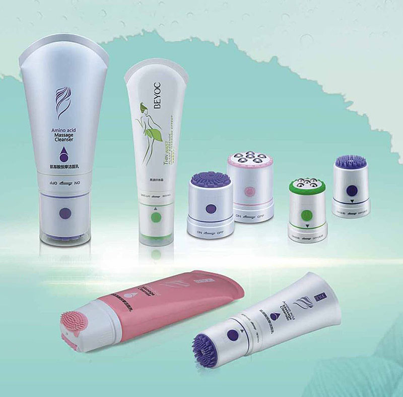 plastic cosmetic tube with massager head
